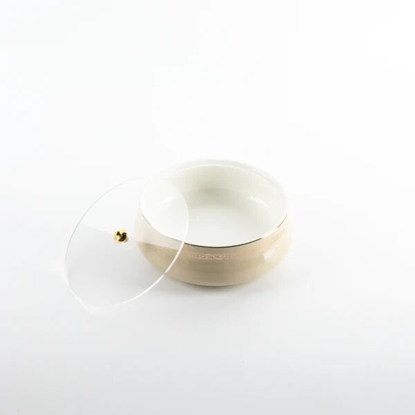 تمرية حجم وسط من نقش - عاجي وذهبي