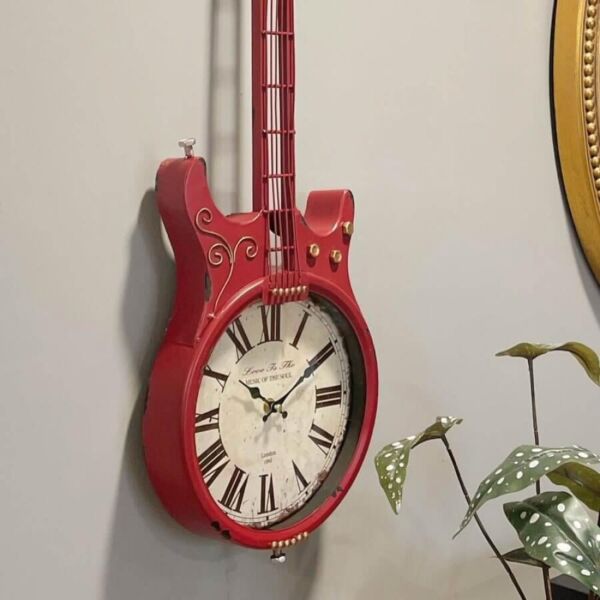 ساعة جدارية شكل جيتار
